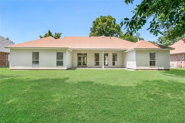 2308 Crossing Ct, Mandeville, LA 70448 - back of house featuring a yard and roof with shingles