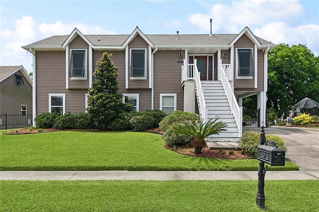 4321 San Remo Rd, New Orleans, LA 70129 - view of front of property featuring stairs and driveway