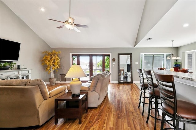 4321 San Remo Rd, New Orleans, LA 70129 - living area with lofted ceiling, a ceiling fan, wood finished floors, baseboards, and recessed lighting