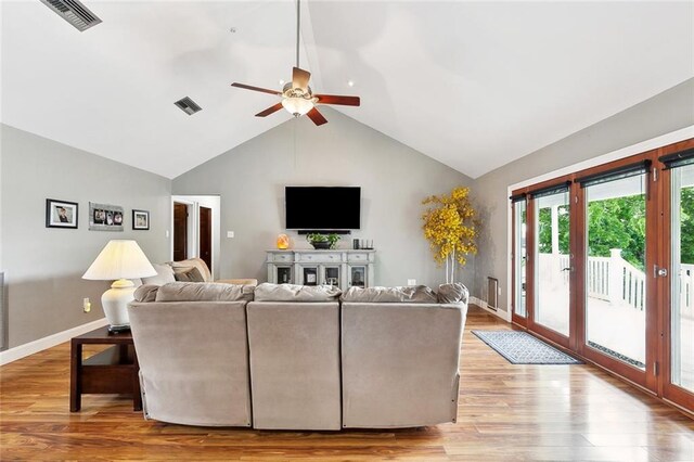 4321 San Remo Rd, New Orleans, LA 70129 - living area with a ceiling fan, wood finished floors, baseboards, and high vaulted ceiling