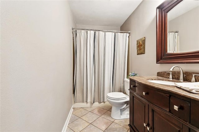 4321 San Remo Rd, New Orleans, LA 70129 - bathroom with vanity, toilet, tile patterned floors, and baseboards