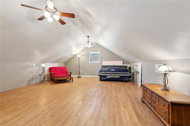 4321 San Remo Rd, New Orleans, LA 70129 - sitting room featuring a ceiling fan, light wood-type flooring, and lofted ceiling