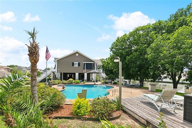 4321 San Remo Rd, New Orleans, LA 70129 - swimming pool featuring a deck and a patio area