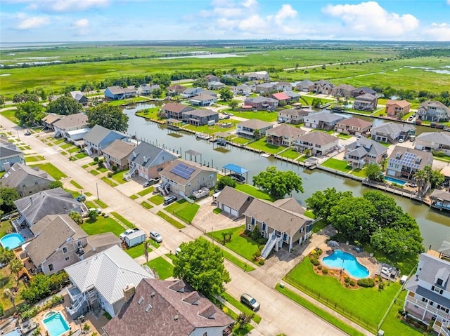 4321 San Remo Rd, New Orleans, LA 70129 - aerial view of residential area with a nearby body of water and a pool