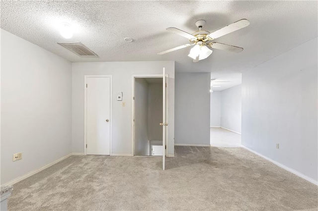 206 Chubasco Ln, Slidell, LA 70458 - carpeted spare room with a ceiling fan, a textured ceiling, and baseboards