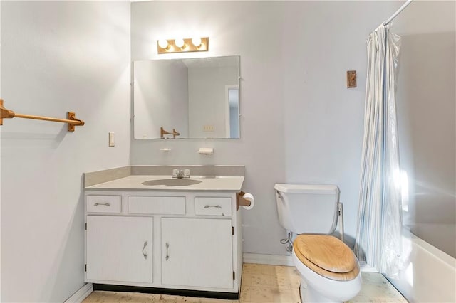 206 Chubasco Ln, Slidell, LA 70458 - bathroom with vanity, toilet, shower / bath combo, and baseboards