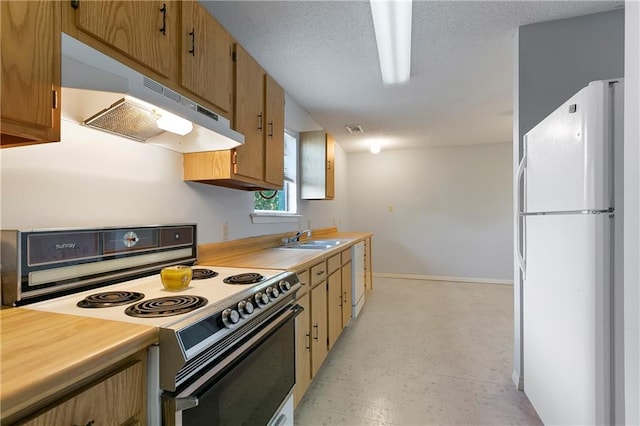 206 Chubasco Ln, Slidell, LA 70458 - kitchen with white appliances, under cabinet range hood, a sink, and light countertops