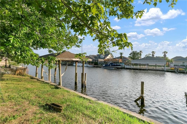 206 Chubasco Ln, Slidell, LA 70458 - dock featuring a water view and a residential view