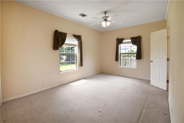 105 Norton Ave, Arabi, LA 70032 - carpeted empty room featuring ceiling fan, baseboards, and ornamental molding