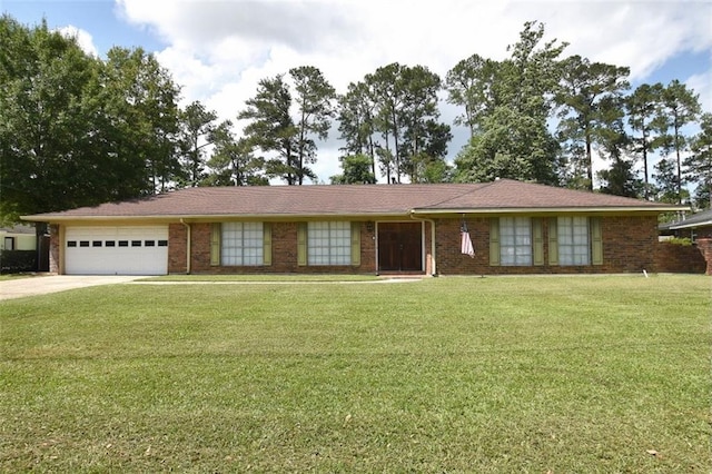 206 Loop Dr, Slidell, LA 70458 - ranch-style home with a garage, a front yard, driveway, and brick siding