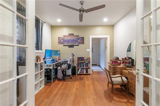 182527 Cambronne St, New Orleans, LA 70118 - home office with ceiling fan, wood finished floors, wood walls, and recessed lighting