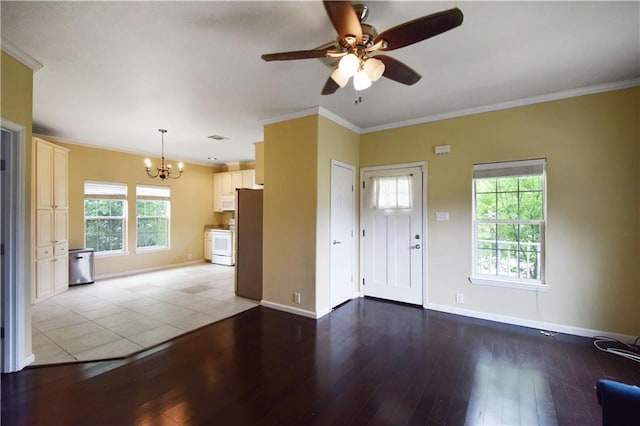 109 Norton Ave, Arabi, LA 70032 - foyer with a chandelier, a ceiling fan, ornamental molding, light wood-type flooring, and baseboards