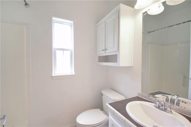 109 Norton Ave, Arabi, LA 70032 - full bathroom featuring toilet, vanity, and a shower