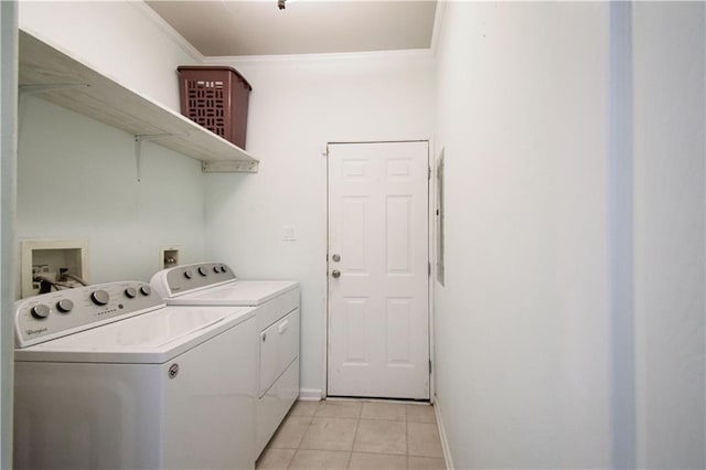 109 Norton Ave, Arabi, LA 70032 - washroom with washer and dryer, ornamental molding, light tile patterned floors, and baseboards