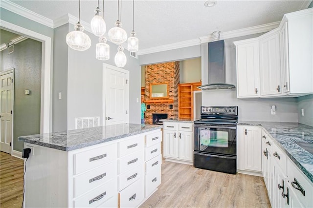 115 Devereux Dr, Slidell, LA 70461 - kitchen with black electric range oven, wall chimney exhaust hood, light wood finished floors, ornamental molding, and stone counters