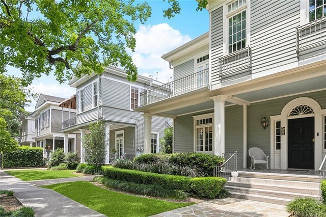 39294 Broadway St, New Orleans, LA 70118 - view of front facade with a balcony and covered porch