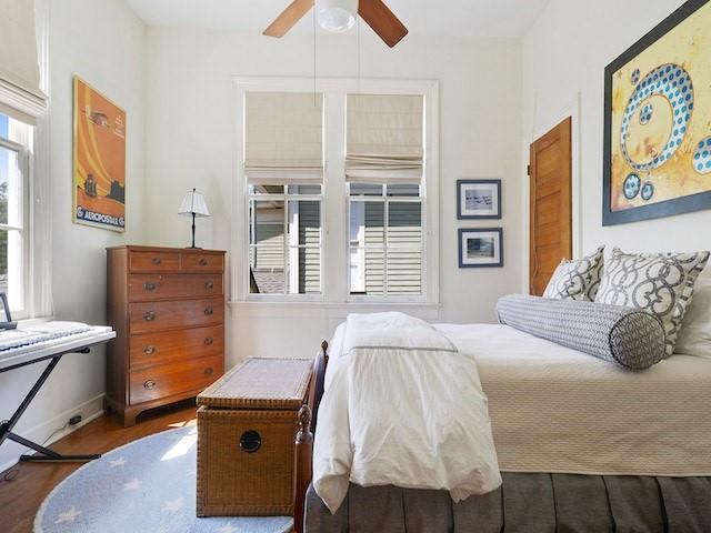 39294 Broadway St, New Orleans, LA 70118 - bedroom featuring wood finished floors, a ceiling fan, and baseboards