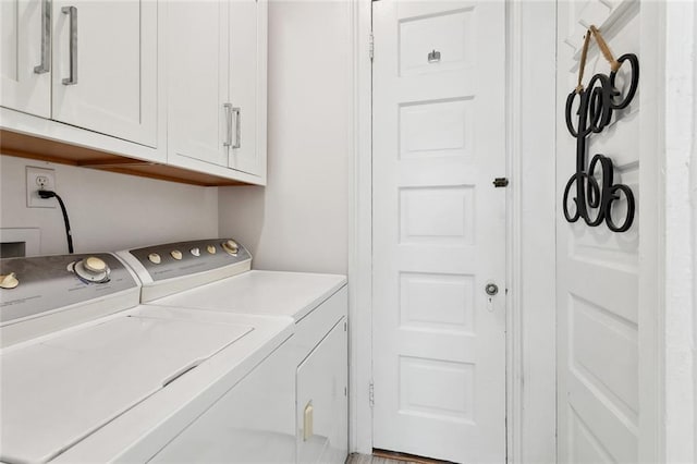 39294 Broadway St, New Orleans, LA 70118 - washroom featuring cabinet space and independent washer and dryer
