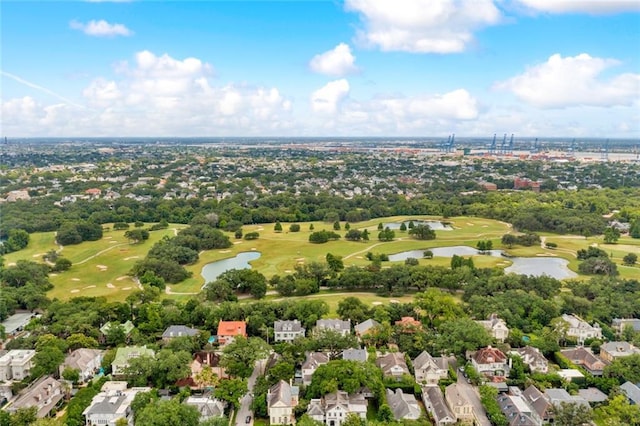 39294 Broadway St, New Orleans, LA 70118 - aerial view of property's location with nearby suburban area, a golf course, a nearby body of water, and a tree filled landscape
