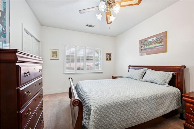 525 N Laura Dr, Mandeville, LA 70448 - bedroom with dark carpet, baseboards, and a ceiling fan