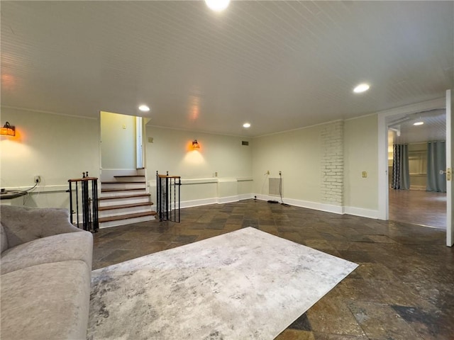 2508 Joseph St, New Orleans, LA 70115 - living area with stone tile flooring, recessed lighting, baseboards, and stairway