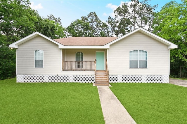 2986 Camellia Dr, Slidell, LA 70458 - view of front facade with covered porch, a front lawn, and a shingled roof