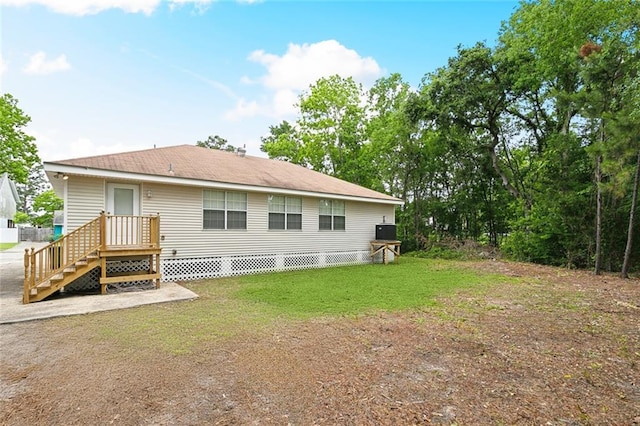 2986 Camellia Dr, Slidell, LA 70458 - rear view of house featuring a lawn