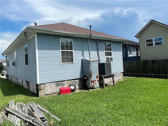 3034 Clouet St, New Orleans, LA 70126 - back of house with cooling unit and central AC
