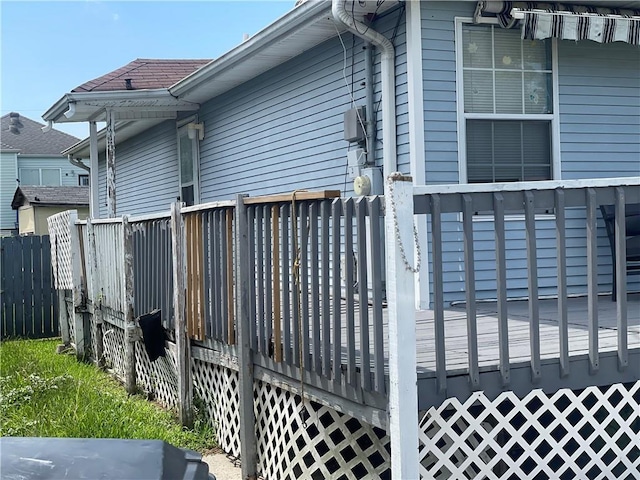 3034 Clouet St, New Orleans, LA 70126 - view of home's exterior with a deck and a shingled roof