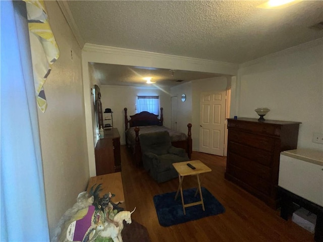 3034 Clouet St, New Orleans, LA 70126 - bedroom with wood finished floors, crown molding, and a textured ceiling