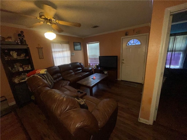3034 Clouet St, New Orleans, LA 70126 - living area featuring wood finished floors, ceiling fan, crown molding, and baseboards