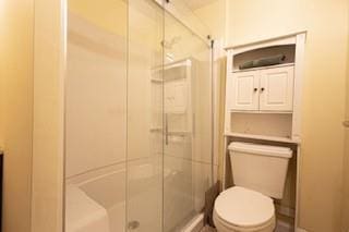 181113 Aubry St, New Orleans, LA 70116 - bathroom featuring toilet and a stall shower