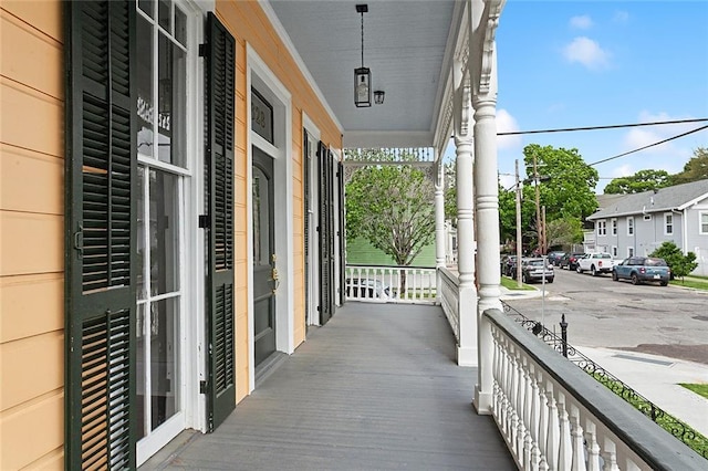 4628 Cleveland Ave, New Orleans, LA 70119 - covered porch with a residential view