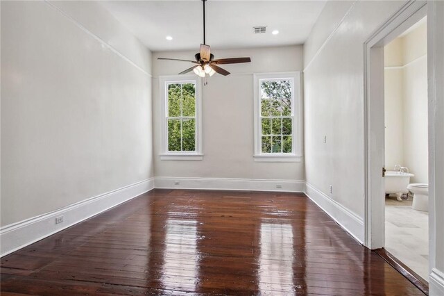 4628 Cleveland Ave, New Orleans, LA 70119 - spare room featuring a ceiling fan, hardwood / wood-style floors, and baseboards