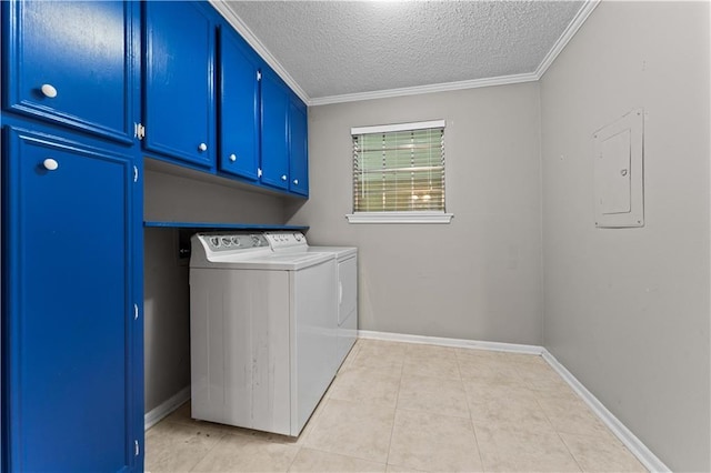 6242 Antioch Blvd, Baton Rouge, LA 70817 - laundry room with washing machine and dryer, a textured ceiling, electric panel, cabinet space, and light tile patterned floors