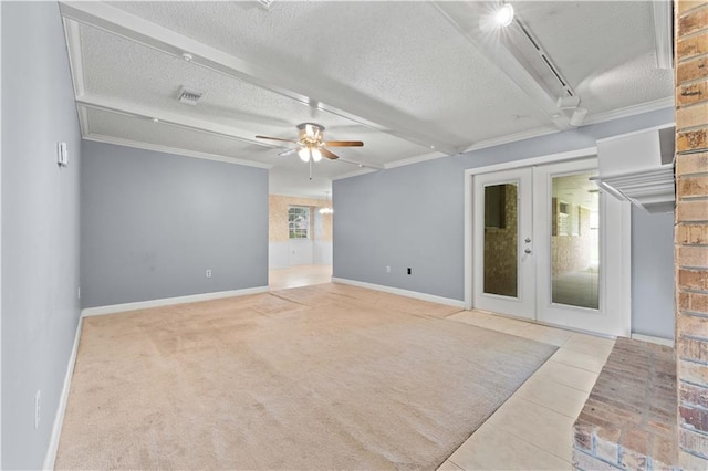 6242 Antioch Blvd, Baton Rouge, LA 70817 - tiled empty room with a textured ceiling, french doors, ceiling fan, baseboards, and crown molding