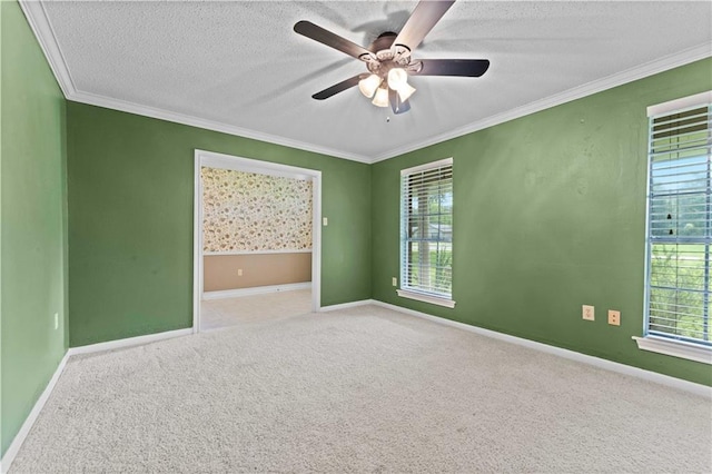 6242 Antioch Blvd, Baton Rouge, LA 70817 - empty room with carpet floors, baseboards, ornamental molding, a ceiling fan, and a textured ceiling