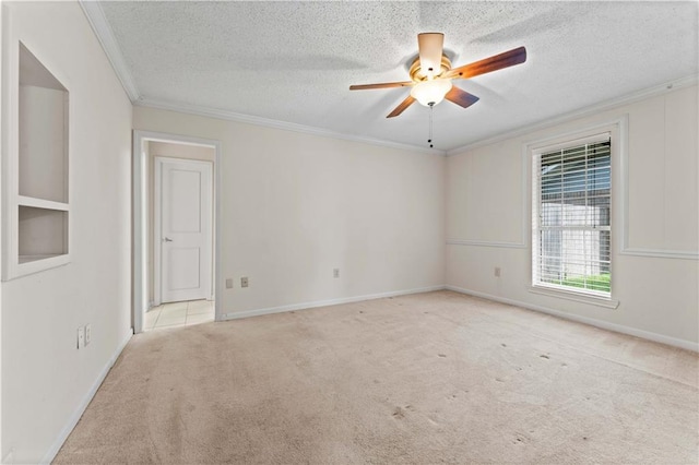 6242 Antioch Blvd, Baton Rouge, LA 70817 - empty room with a ceiling fan, carpet flooring, ornamental molding, a textured ceiling, and baseboards