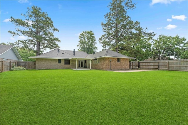6242 Antioch Blvd, Baton Rouge, LA 70817 - back of property with a patio area and brick siding