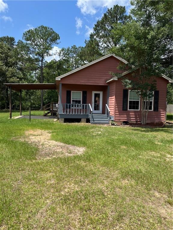 42984 River Birch Ln, Franklinton, LA 70438 - view of front of home featuring a front lawn and a porch