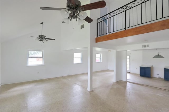 503 Park Blvd, Braithwaite, LA 70040 - unfurnished living room with a ceiling fan, a high ceiling, and speckled floor