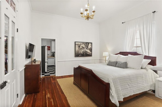 2728 Bell St, New Orleans, LA 70119 - bedroom featuring a chandelier, wood-type flooring, wainscoting, crown molding, and freestanding refrigerator