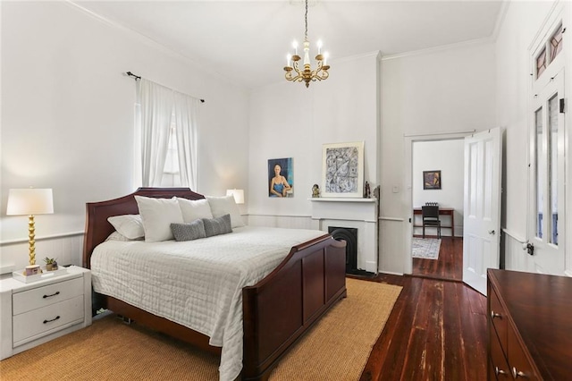 2728 Bell St, New Orleans, LA 70119 - bedroom featuring a chandelier, wood finished floors, and ornamental molding