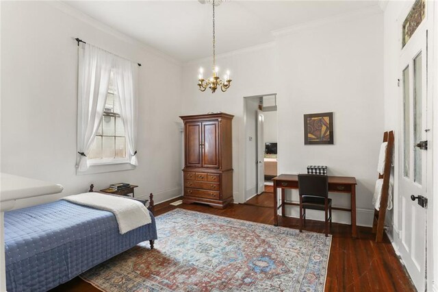 2728 Bell St, New Orleans, LA 70119 - bedroom with a chandelier, crown molding, and wood finished floors