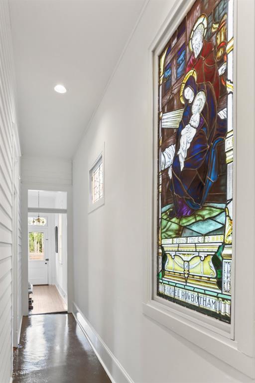 2728 Bell St, New Orleans, LA 70119 - hallway with baseboards, recessed lighting, and wood finished floors
