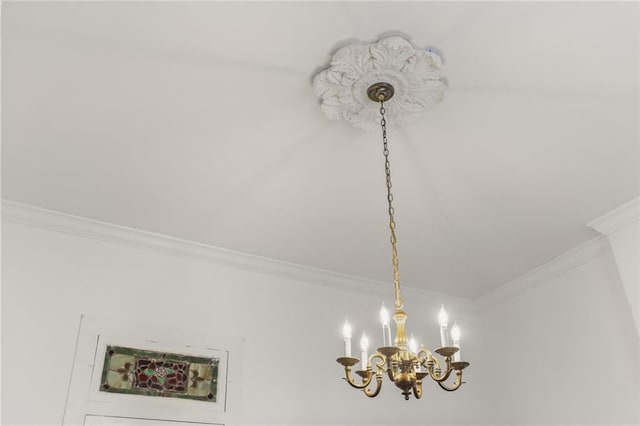2728 Bell St, New Orleans, LA 70119 - detailed view of crown molding and a chandelier
