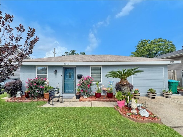 4153 W Loyola Dr, Kenner, LA 70065 - view of front of property with a front yard, brick siding, and a shingled roof