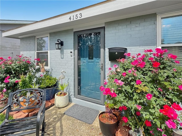 4153 W Loyola Dr, Kenner, LA 70065 - doorway to property with brick siding