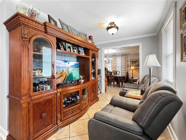 4153 W Loyola Dr, Kenner, LA 70065 - living room with light tile patterned floors, a chandelier, and ornamental molding