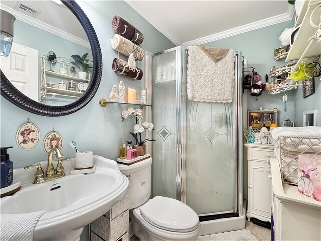 4153 W Loyola Dr, Kenner, LA 70065 - full bath with a sink, ornamental molding, a stall shower, and toilet